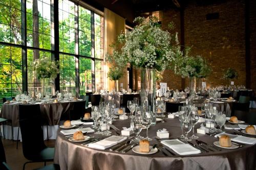 a table set up for a banquet in a room at The Roundhouse in Beacon