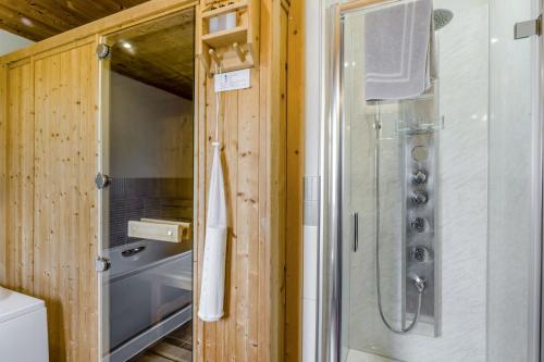 a shower with a glass door in a bathroom at Field View 1 bed-No Pets- Walnut in Eye