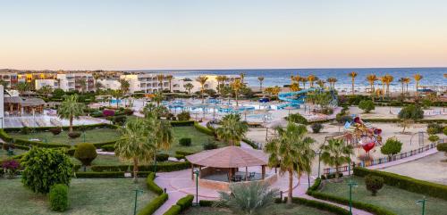 an aerial view of a resort with a water park at Bliss Nada Beach Resort in Marsa Alam City