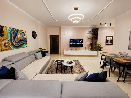 Zona d'estar a Deluxe Apartment