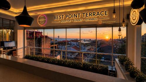 a restaurant with a view of a city from a building at Best Point Hotel Sultanahmet,Istanbul in Istanbul