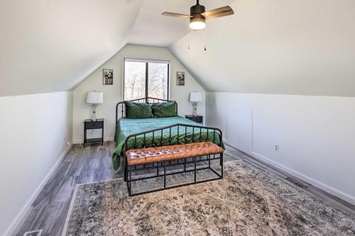 a bedroom with a bed and a window at Hot Tub, Pool, Dock: 2 Cabins Lakeview Grand Lake in Grove