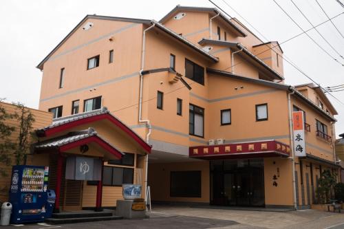 a large building with a store in front of it at Yuzennoyado Toukai in Ureshino