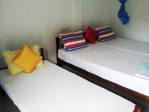 Una cama o camas en una habitación de Calidan