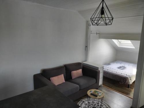Llit o llits en una habitació de Le Studio du Brochy
