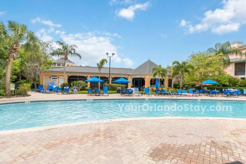 a swimming pool in front of a resort at Bahama Bay- Two bedrooms condo fully equipped in Kissimmee