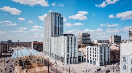 a rendering of a tall white building in a city at Hampton by Hilton Łódź City Center in Łódź