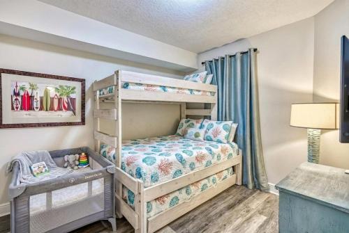 a bedroom with bunk beds and a desk at 3BR Beachfront Huge Balcony 2 Pools Luxury in Fort Walton Beach