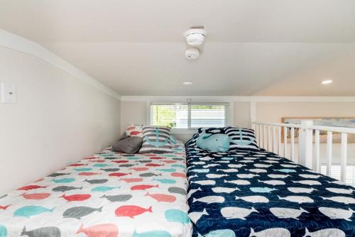 a bedroom with two beds in a room at Near Beach • Pool + Amenities • Sleeps 8 in Swain