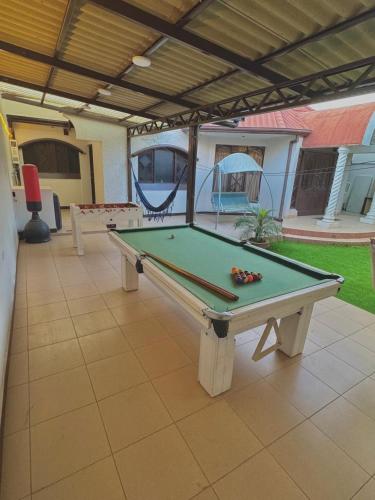a pool table in the middle of a patio at TheBunker in Cochabamba