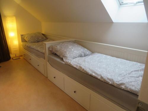 Postel nebo postele na pokoji v ubytování Wiflinger Graben Einfamilienhaus