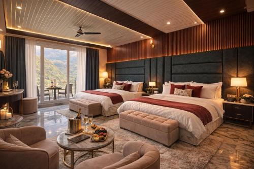 a large bedroom with two beds and a table at Trishul inn in Rudraprayāg