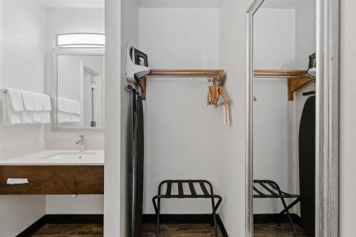 a bathroom with a shower and a sink at Quality Inn Duluth - Atlanta Northeast in Duluth