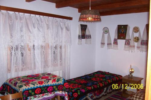 מיטה או מיטות בחדר ב-Busta House