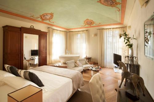 Postel nebo postele na pokoji v ubytování Borgo Ramezzana Country House