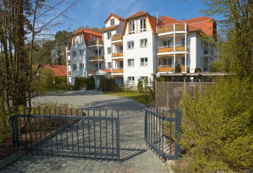 a gate in front of a building at Ferienwohnung Katja in der Villa Seeblick in Bad Saarow