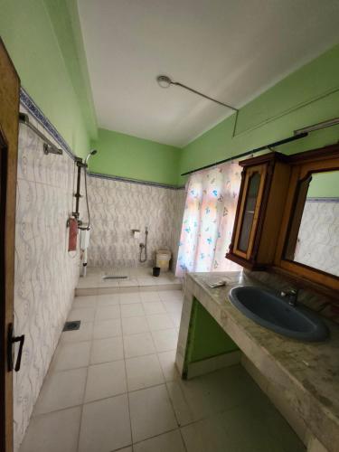a bathroom with a sink and a toilet at Om Raghav Homestay in Kathmandu