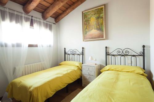 Un pat sau paturi într-o cameră la Casas de la Fuente