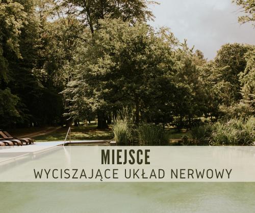 a sign that reads message westchester landscape ukald network at Hotel Dębowy Biowellness & SPA Góry Sowie in Bielawa