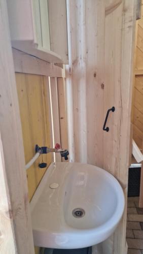 a bathroom with a white sink in a room at Camp Starshine near Bled in Begunje na Gorenjskem