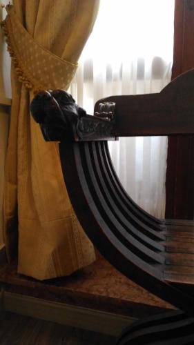 a close up of a curtain next to a window at Albergo Casa Peron in Venice