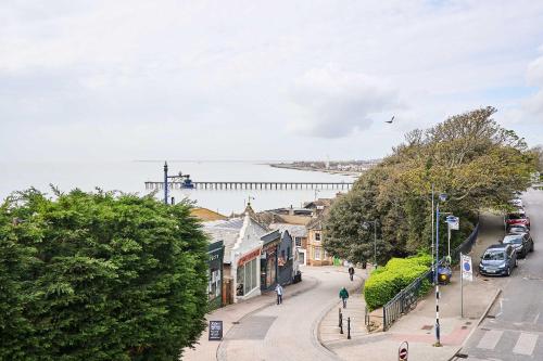 a street in a town with a body of water at Host & Stay - 2a Hamilton Road in Felixstowe