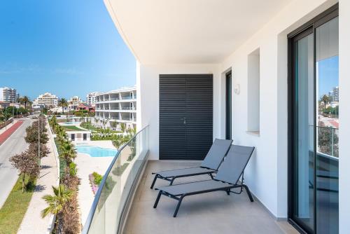 Sunlit Vista - Panoramic Balcony with Sea View