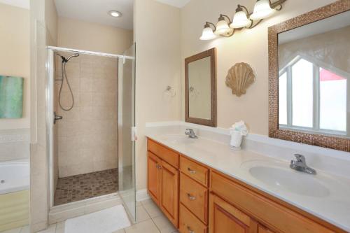a bathroom with a sink and a shower at Five on the Beach by Pristine Property Vacation Rentals in Cape San Blas