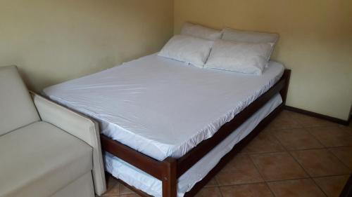 Postel nebo postele na pokoji v ubytování Apart Hotel Praia do Pero