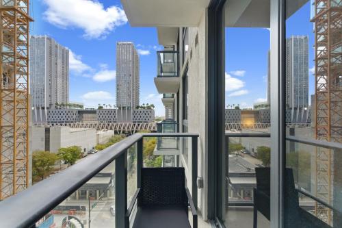 a balcony with a view of a city at Downtown Studio Steps from Kaseya Center in Miami