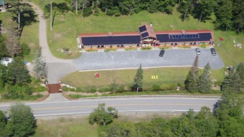 an overhead view of a large building on a road at Gore Mountain Lodge in North Creek