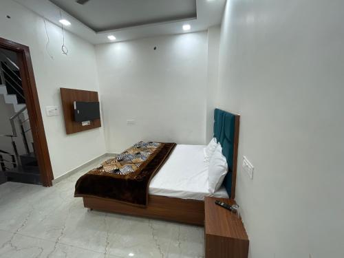 a bedroom with a bed in a room at Hotel 48 in Amritsar