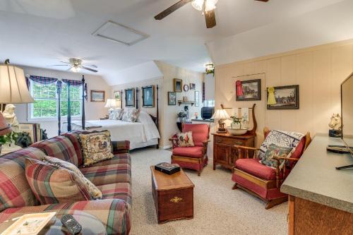 a living room with a couch and a bed at Pool Access! Cozy Couple's Getaway in Kilmarnock in Kilmarnock