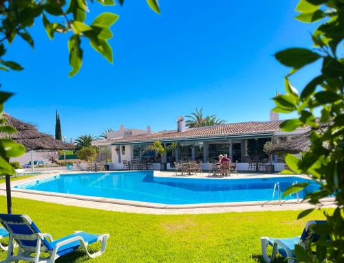 an image of a house with a swimming pool at Vila Nova- by Portugalferias in Carvoeiro
