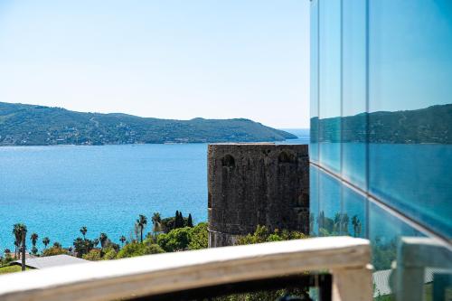 a view of the ocean from a building at Castello Mare Residence in Herceg-Novi