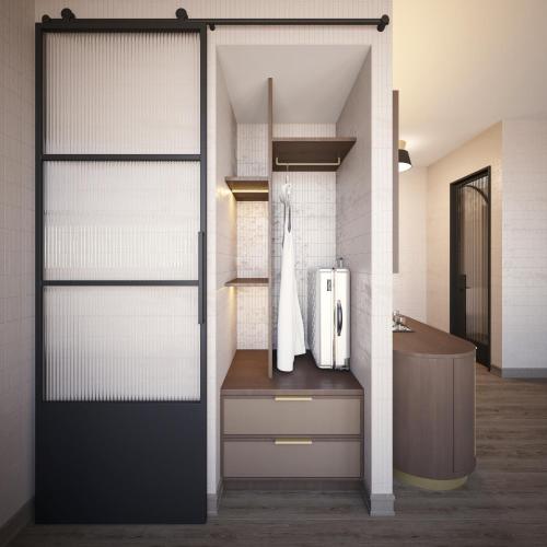 a bathroom with a refrigerator and a sink at The Berkeley Richmond, Outset Collection by Hilton in Richmond