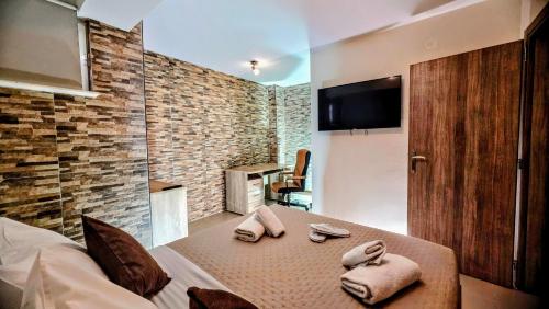 TV a/nebo společenská místnost v ubytování Bazaar Hideaway