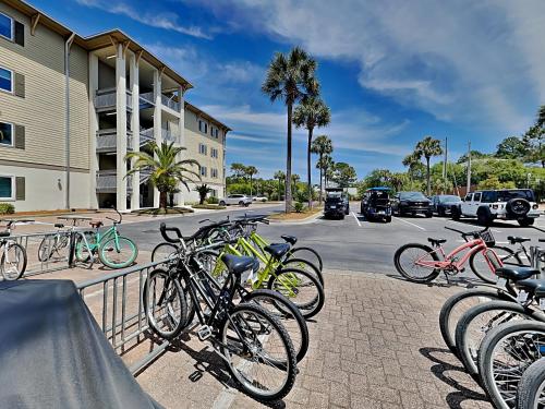 a bunch of bikes parked next to a street at Seagrove Highlands #2104 in Santa Rosa Beach