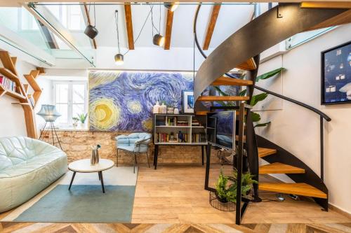 a living room with a spiral staircase and a painting at Apartment Luxury Palace No1 in Split