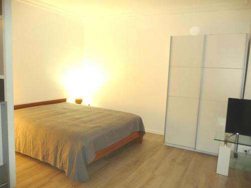 Cama o camas de una habitación en Tourelle