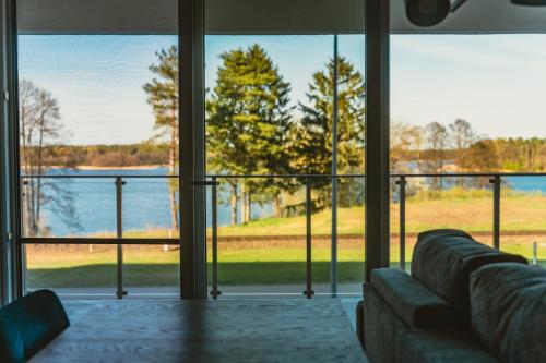 Apartament Bassotto nad jeziorem Białym