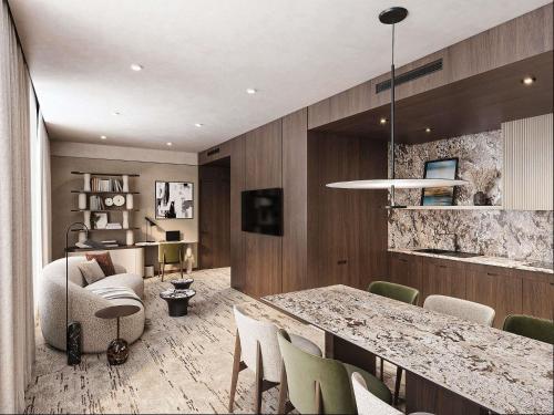 a dining room with a table and some chairs at Novotel Lviv Center in Lviv