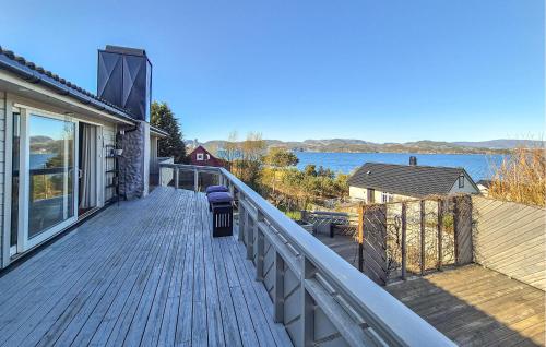a balcony of a house with a view of the water at Nice Home In Ask With Wifi in Ask i Nordhordaland