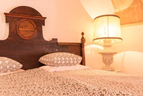 Ένα ή περισσότερα κρεβάτια σε δωμάτιο στο Agroturisme s' Horta