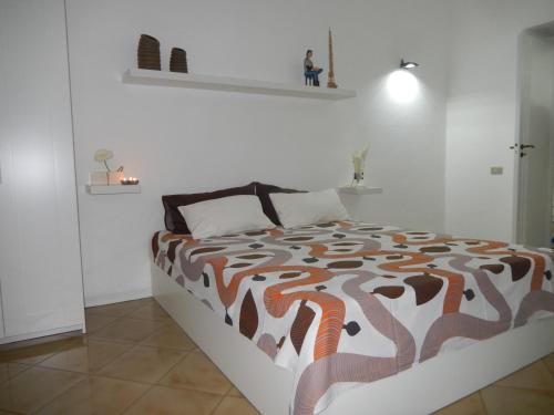 سرير أو أسرّة في غرفة في Sant' Alfonso Maria de Liguori