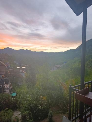 a view of the mountains from the balcony of a house at SEENBEST Ella in Ella