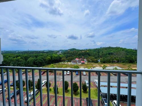 a view of a parking lot from a balcony at D'Camellia 43500 Semenyih Homestay in Semenyih