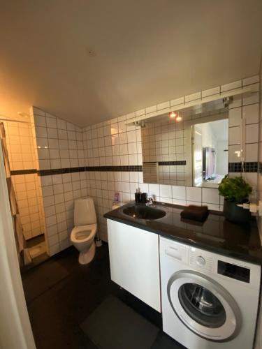 Et badeværelse på Vshus Apartment-2 Bedrooms near city center
