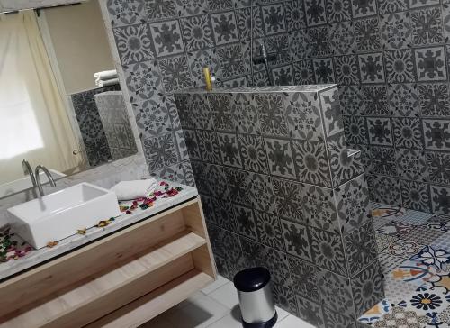 a bathroom with a sink and a mirror at Le havre de paix in Marrakesh