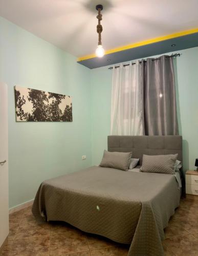 a bedroom with a bed in a room at M&L apartment Large in Perea